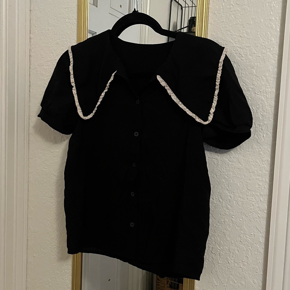 Black short sleeve button up with white lace accents